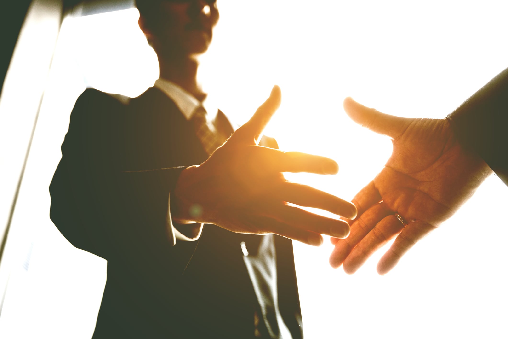 Japanese business handshake inside the office, Japan.
