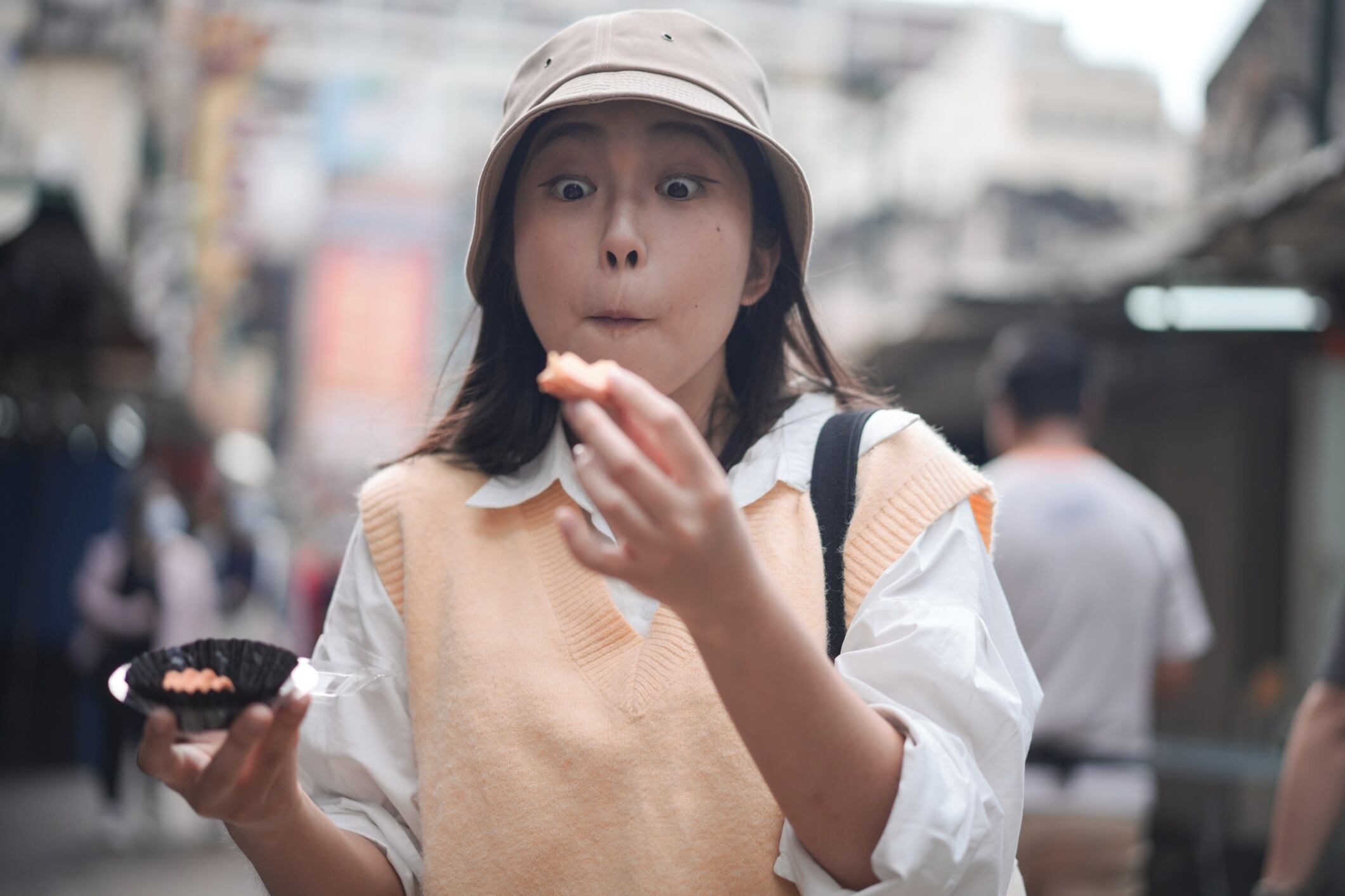 Young girl surprised at a snack