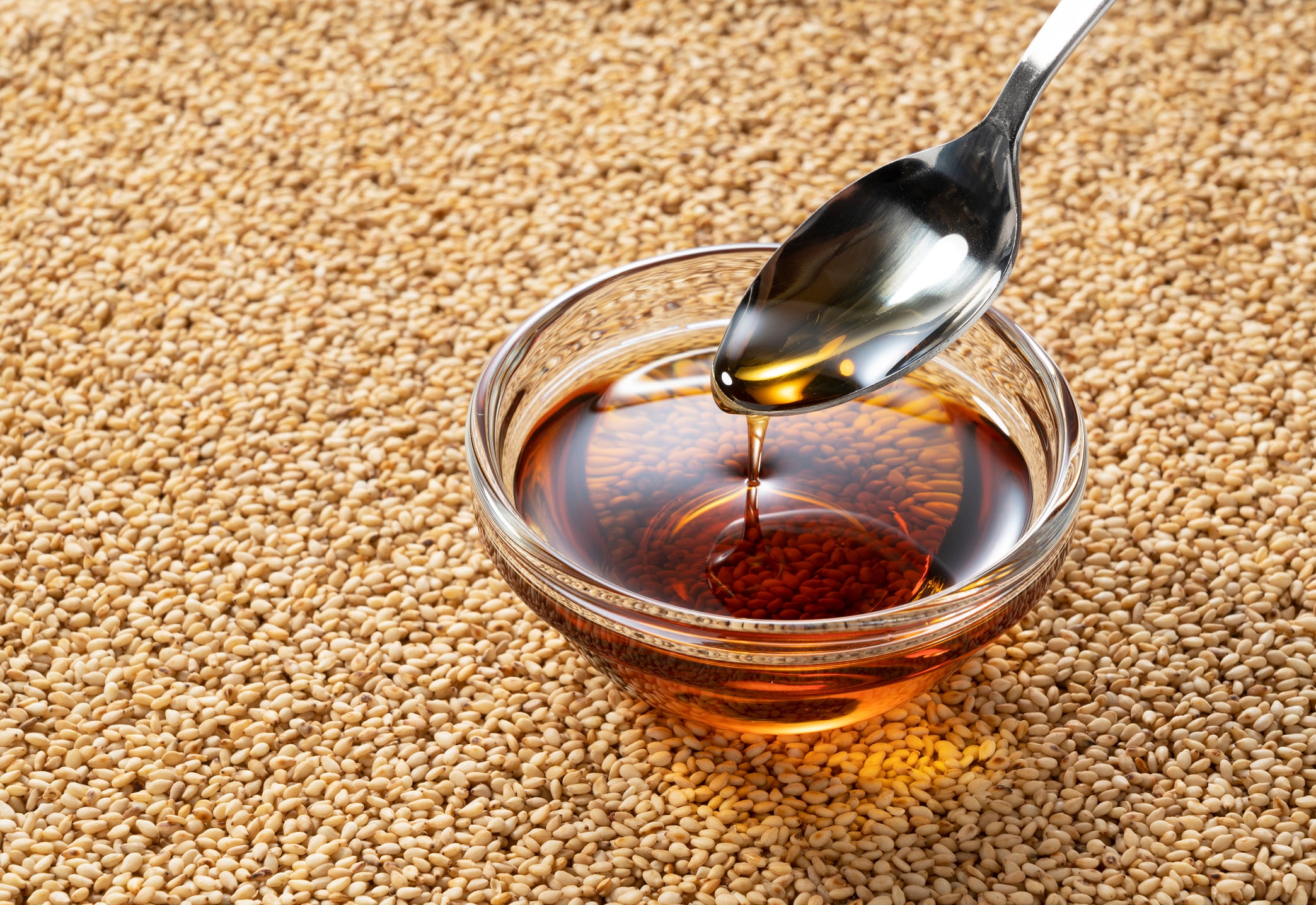 Scooping up sesame oil