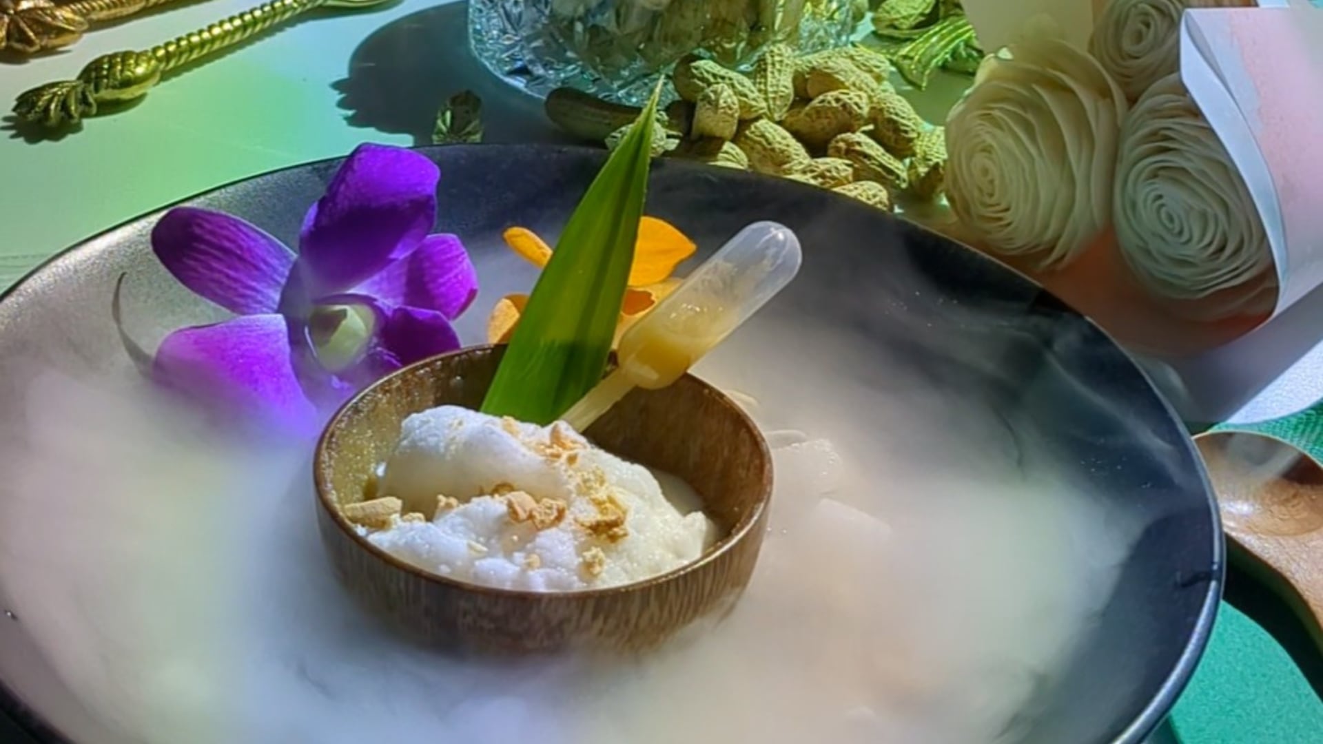 Coconut milk slushie with a hint of kaya toast: Served on a bed of dry ice, IFF showcases an immersive experience that combines scent, taste, and sound to reflect the cultural significance of Singapore flavours.
