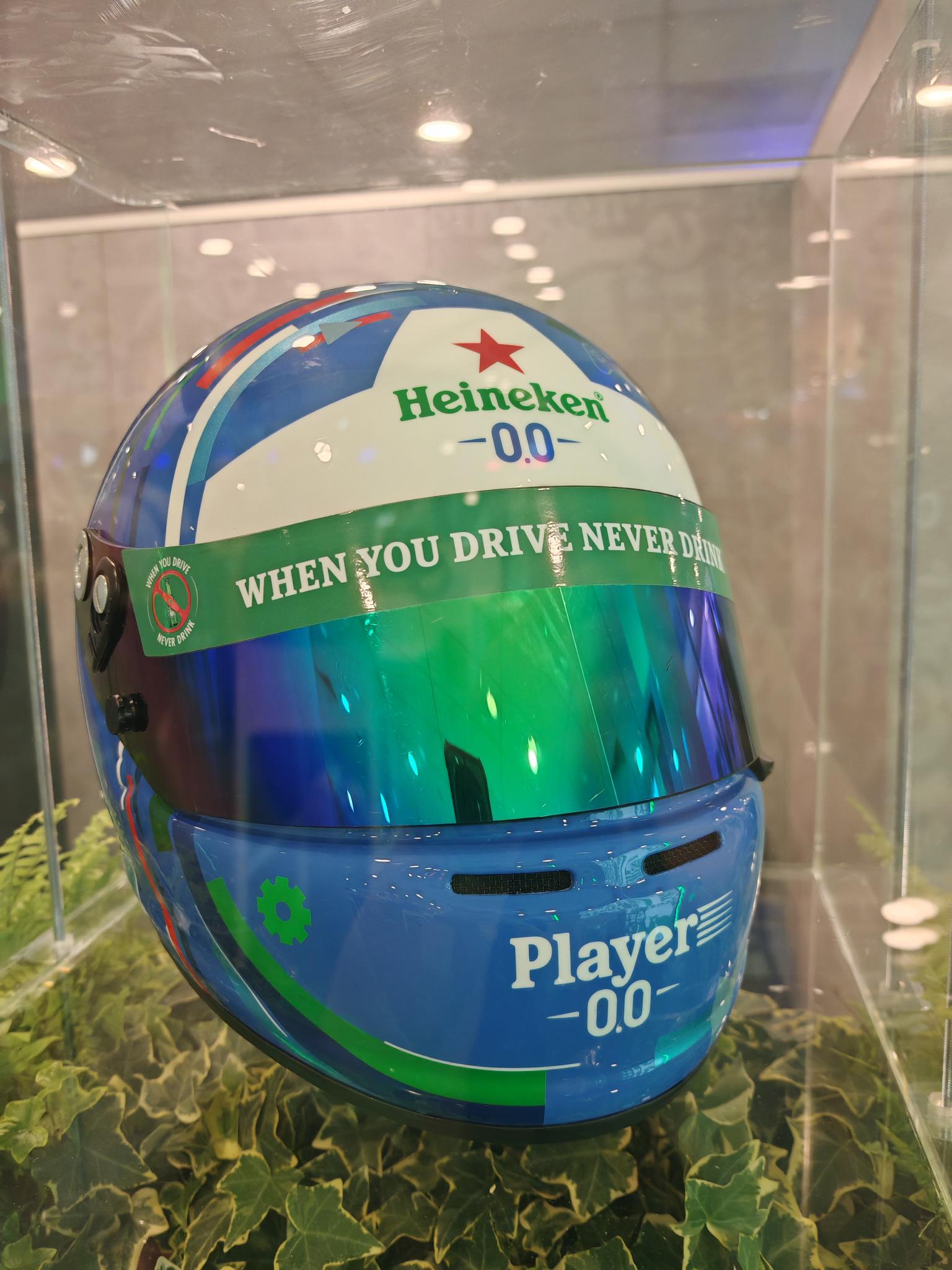 Heineken 0.0 racing helmet with its tagline 'When You Drive, Never Drink'