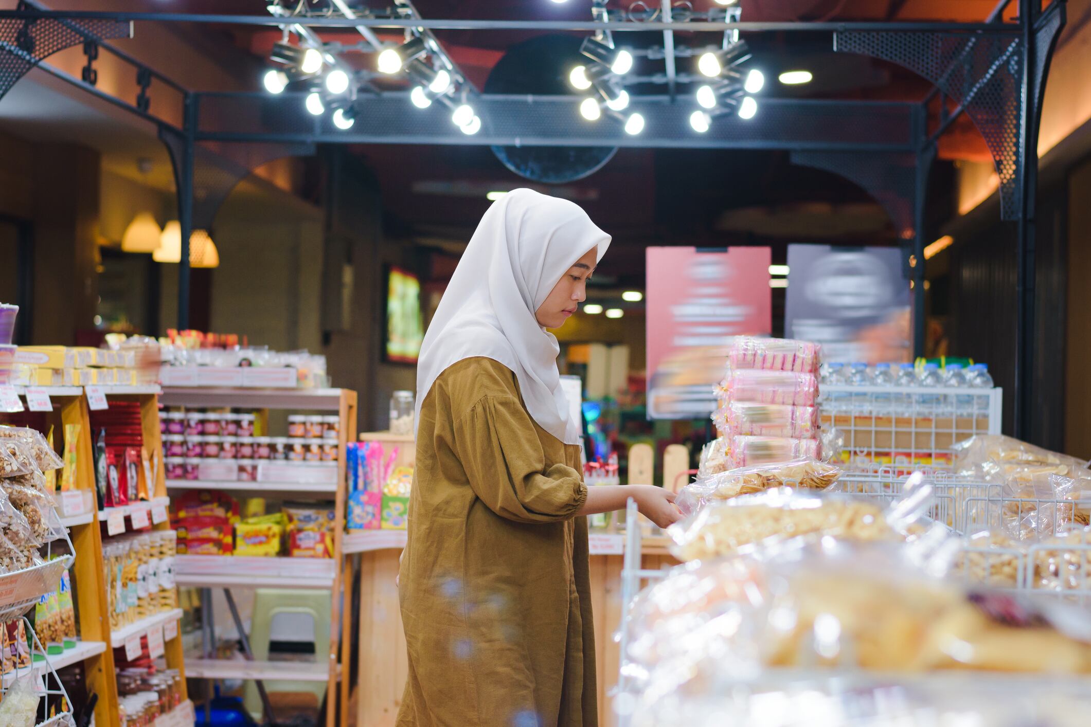 Indonesian woman shopping for halal food