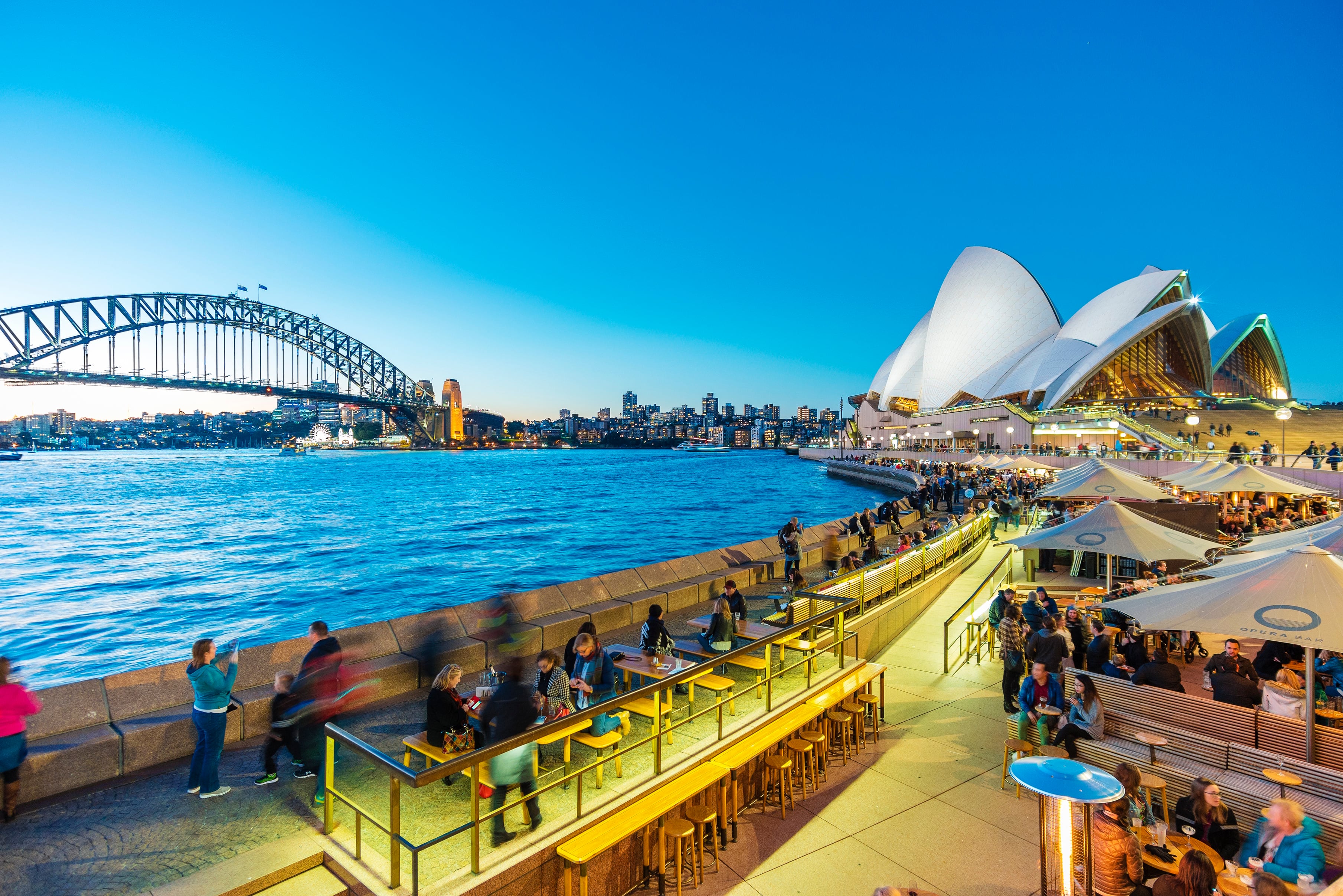 People dining at outdoor restaurants in Circular Quay in Sydney