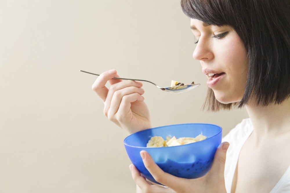 woman_consumer_eating_breakfast_cerealOPTIMIZED.jpg