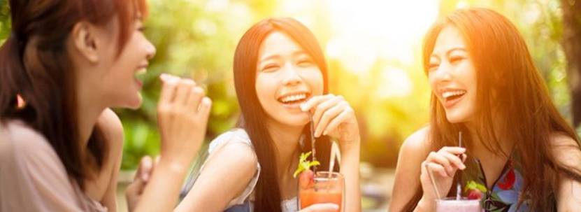 Young consumers drinking smoothies