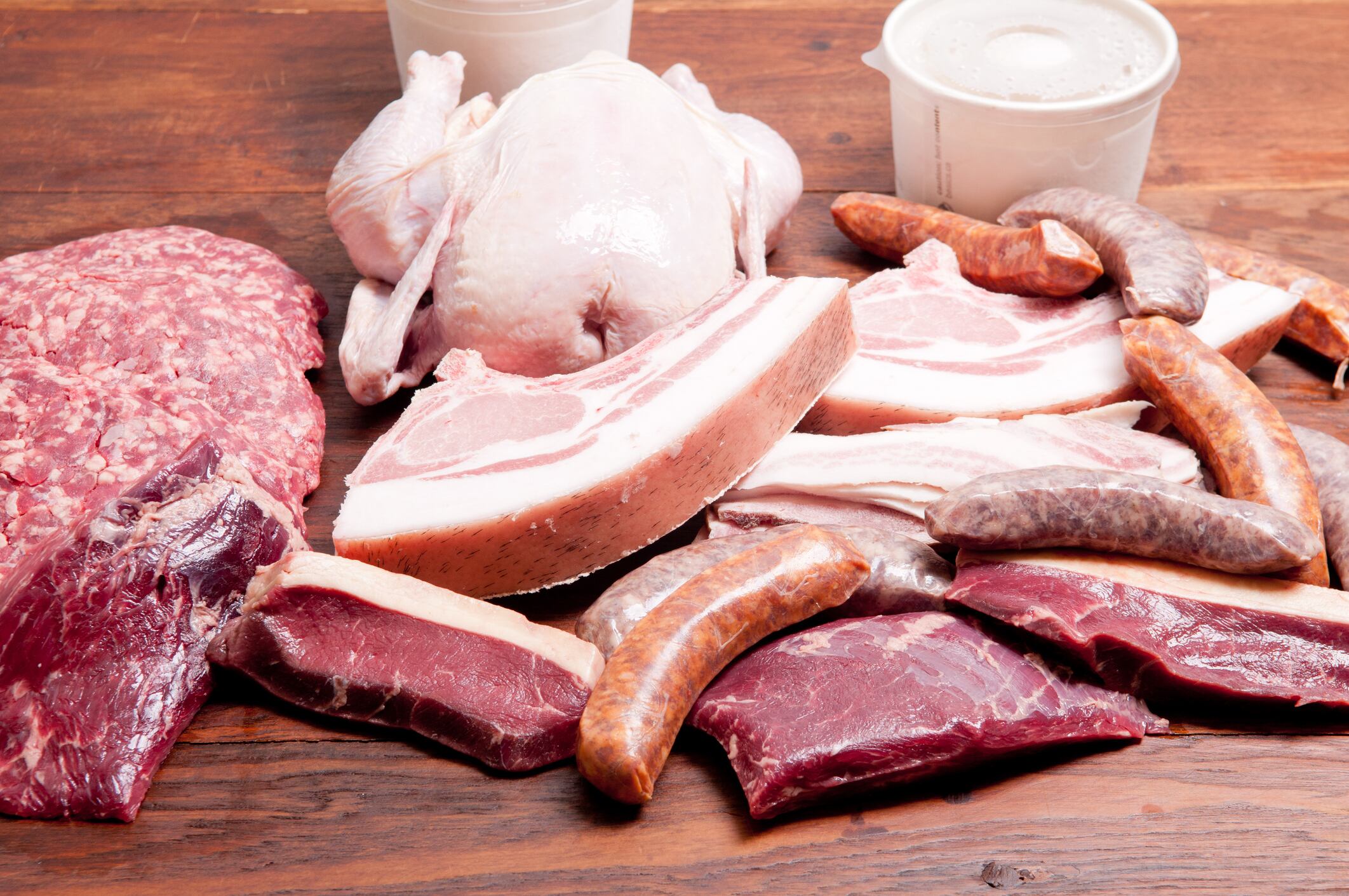 An assortment of sausages, raw and minced meat