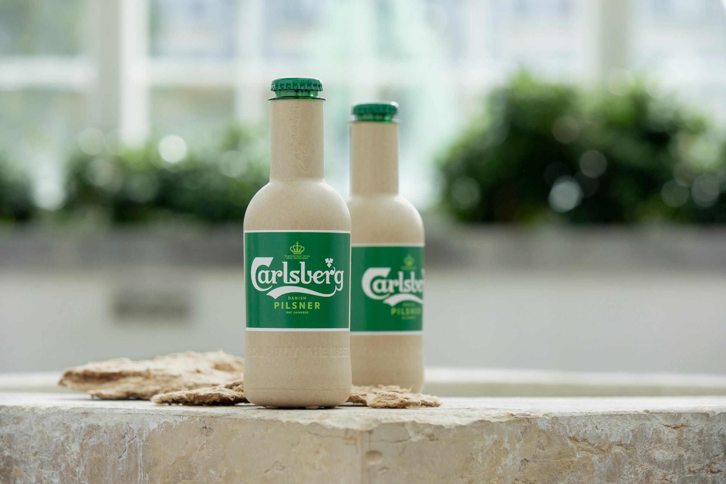 Carlsberg showcases paper bottle prototype