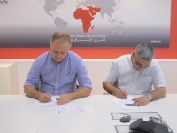 Clive Smith, Zone VP, Sidel GMEA and Abbas Sayeed, CEO, Sayeed International during the signing ceremony