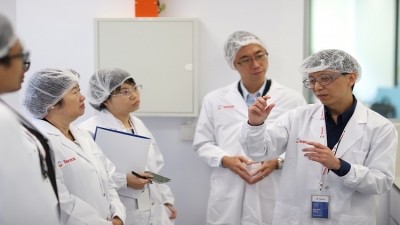 Kenneth Wang (1st from the right), senior application and customer technical support manager, conducting a lab tour for the media. 
