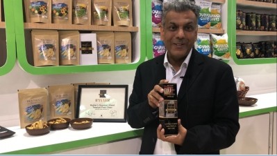 Narayan holding Hunter Foods' Gulfood Innovation Awards 2019 award for Best New Product Development.