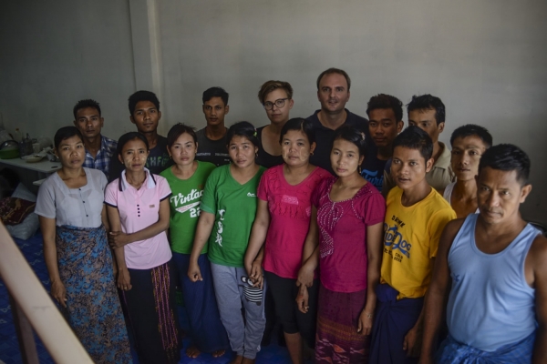 All 14 Burmese migrant workers with two MWRN activists in Thailand