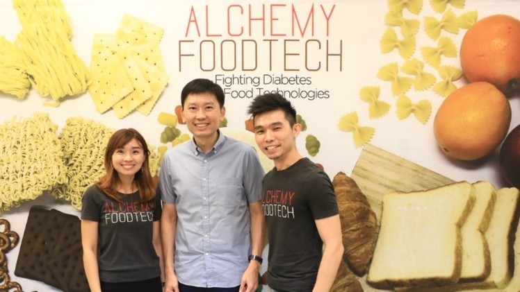 Alchemy Foodtech co-founder Verleen Goh (from left), senior minister of state, Ministry of State and Industry Chee Hong Tat, and CEO Alan Phua at the opening of the Cooklab@Alchemy. ©Alchemy Foodtech