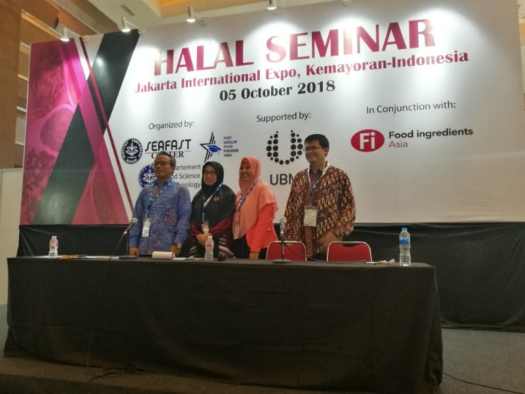 Dr Yuliana (second from left) with other speakers at the Halal Seminar in Fi Asia, Jakarta.