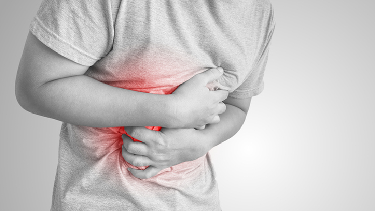 Abdominal pain is one of the most commonly reported side-effects related to probiotic use.  ©Getty Images 