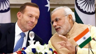 Meetings with international leaders, such as with Australia's Tony Abbott, have brought newfound credibility to Modi's India