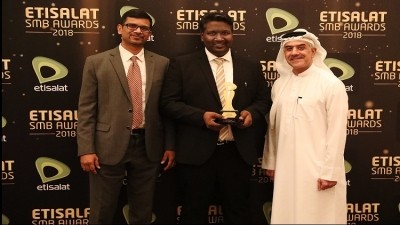 PC Kabeer (middle), the co-founder of FarmChimp, was awarded the start-up of the year at the "Etisalat SMB Awards 2018" last month. 