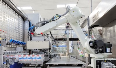 Intelligent robots being used in Yili's liquid milk factory . ©Yili